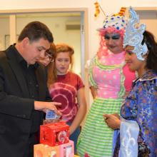 North West Magician Darren Brand performing for Cbeebies TV presenter Nisha Anil