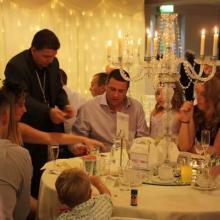 Darren Brand is at a table at a wedding reception  in Lancashire.